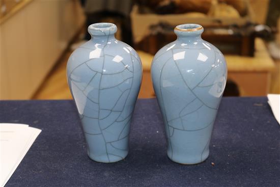 A pair of blue Chinese crackleware vases on stands